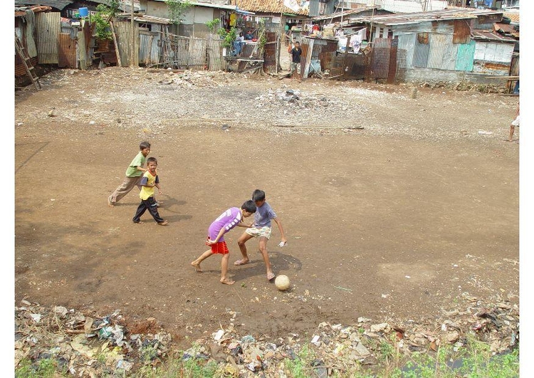 Photo playing soccer (slums)