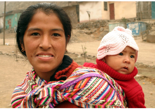 woman carrying baby on her back