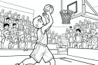 boy plays basketball