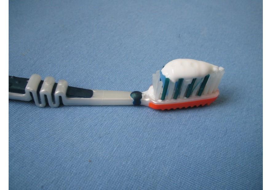 toothbrush with toothpaste Photo toothbrush with toothpaste