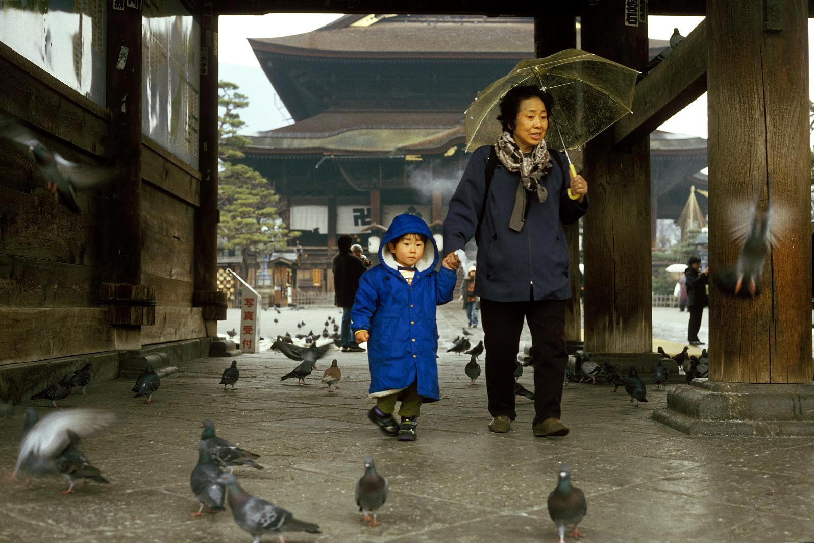 woman and girl at temple Photo woman and girl at temple