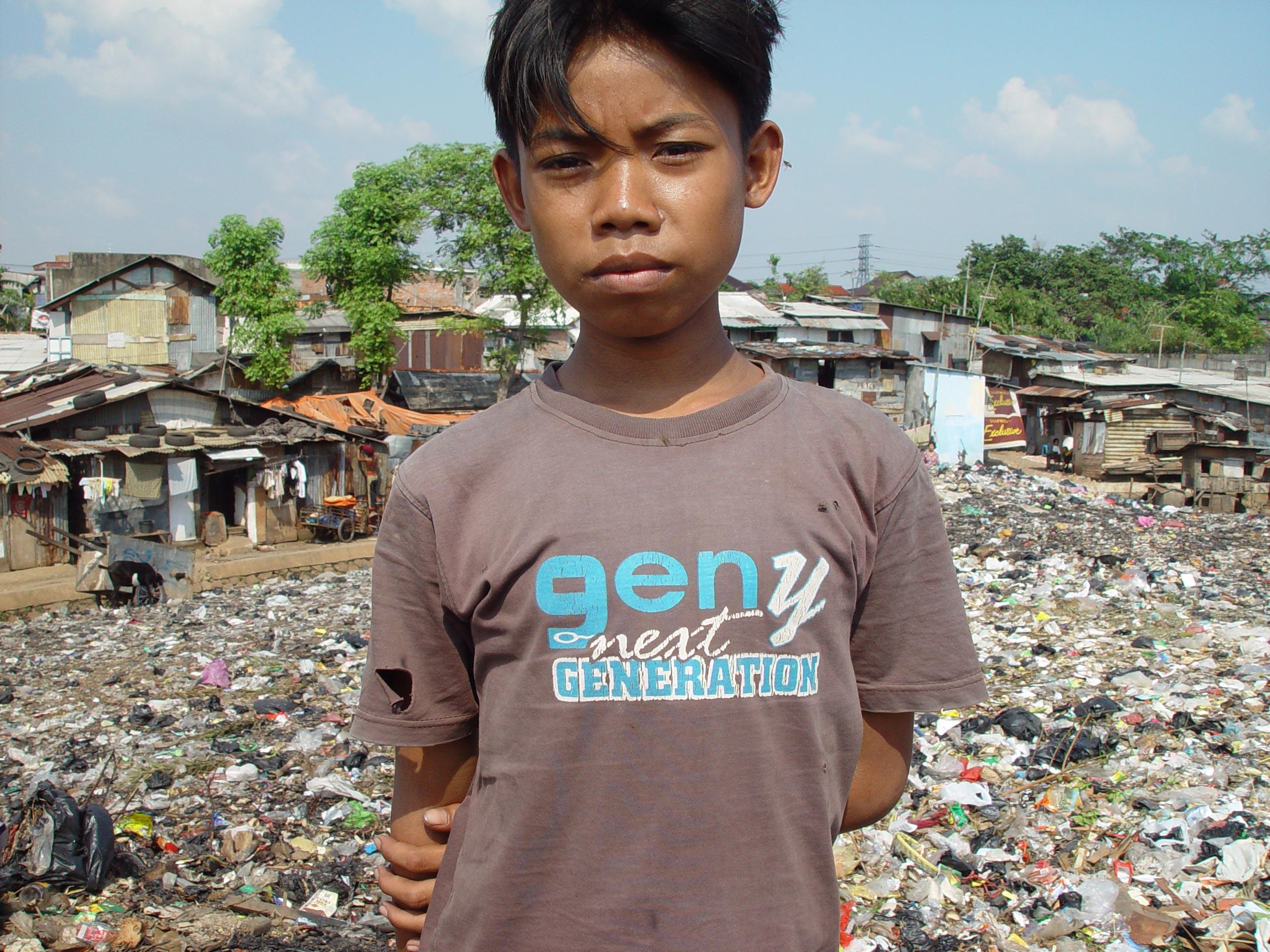 boy in slum area Photo boy in slum area