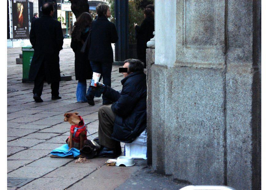 Photo beggar in Milan