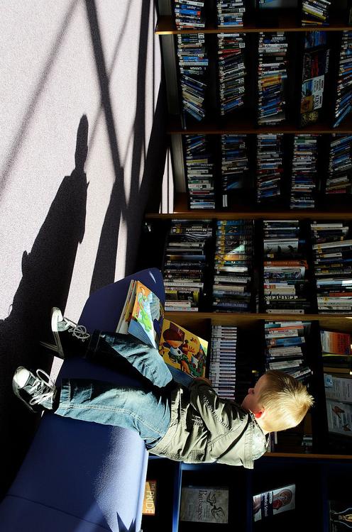 child in library