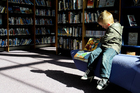 child in library