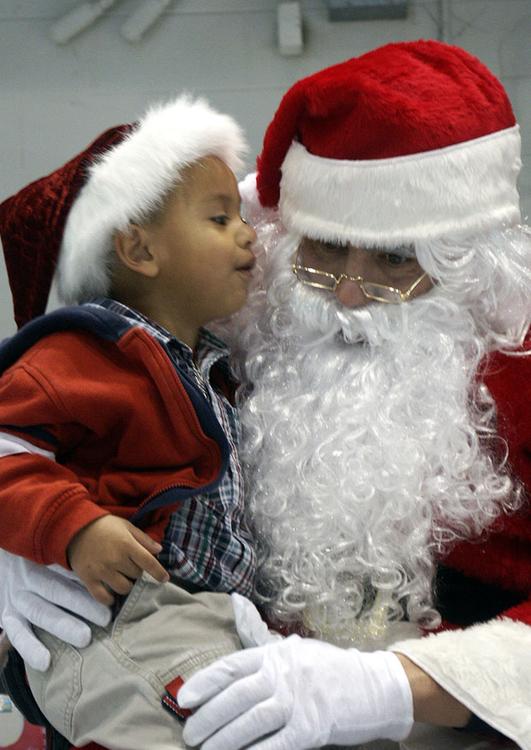 child with Santa Claus