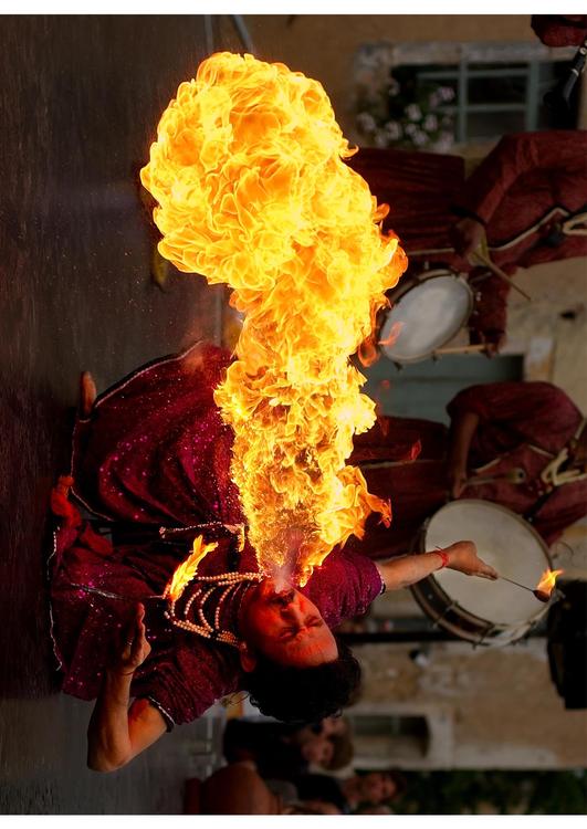 Fire-eater from the "Jaipur Maharaja Brass Band"