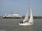 Photo pier with sailing boat