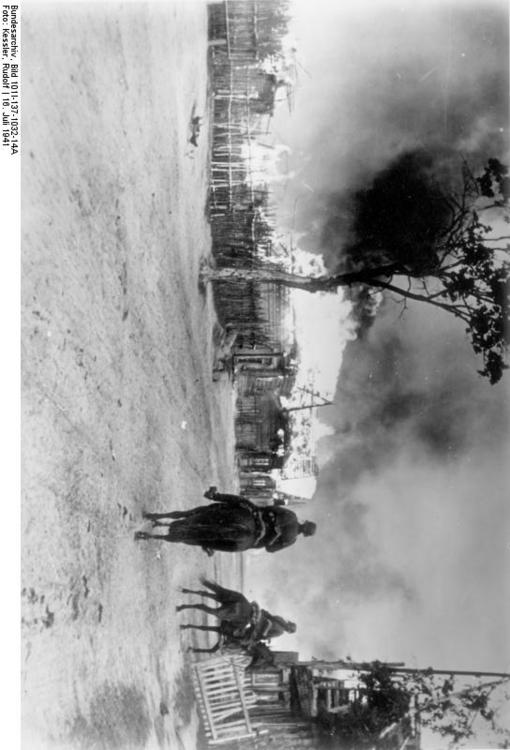 Russia - village on fire with cavalry