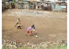 Photos playing soccer (slums)