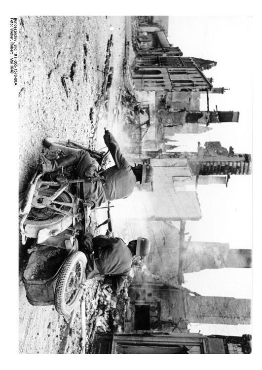 Solidiers riding through ruins - France