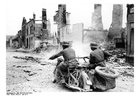 Photos Solidiers riding through ruins - France